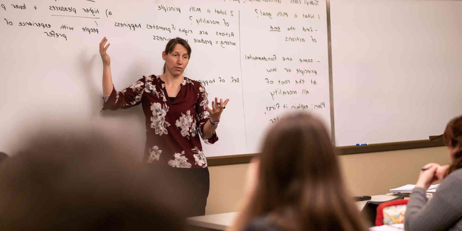 A professor teaches students in class